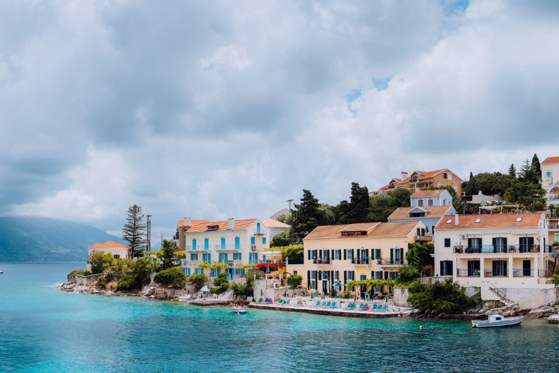 fiskardo village with boats and colorful houses on kefalonia island greece