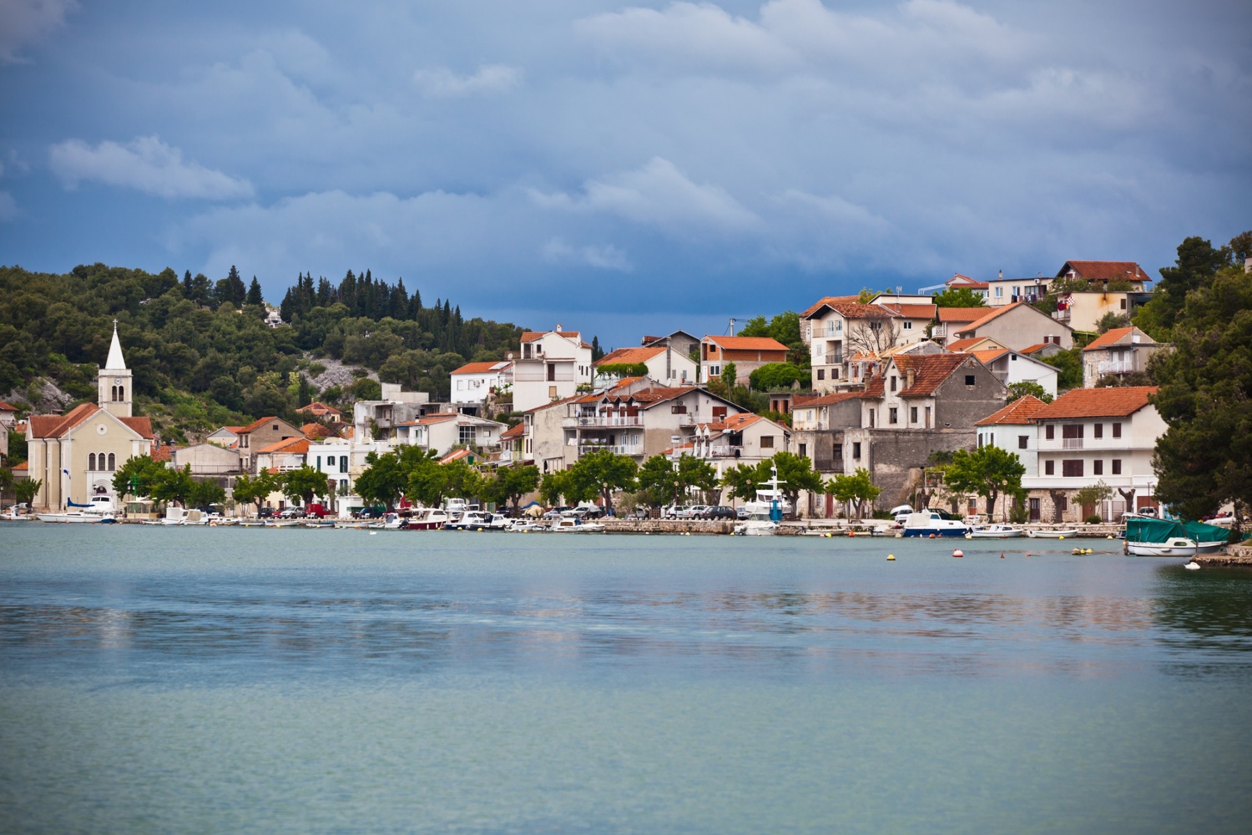 zaton croatia coastal town with church and harbor view from the sea