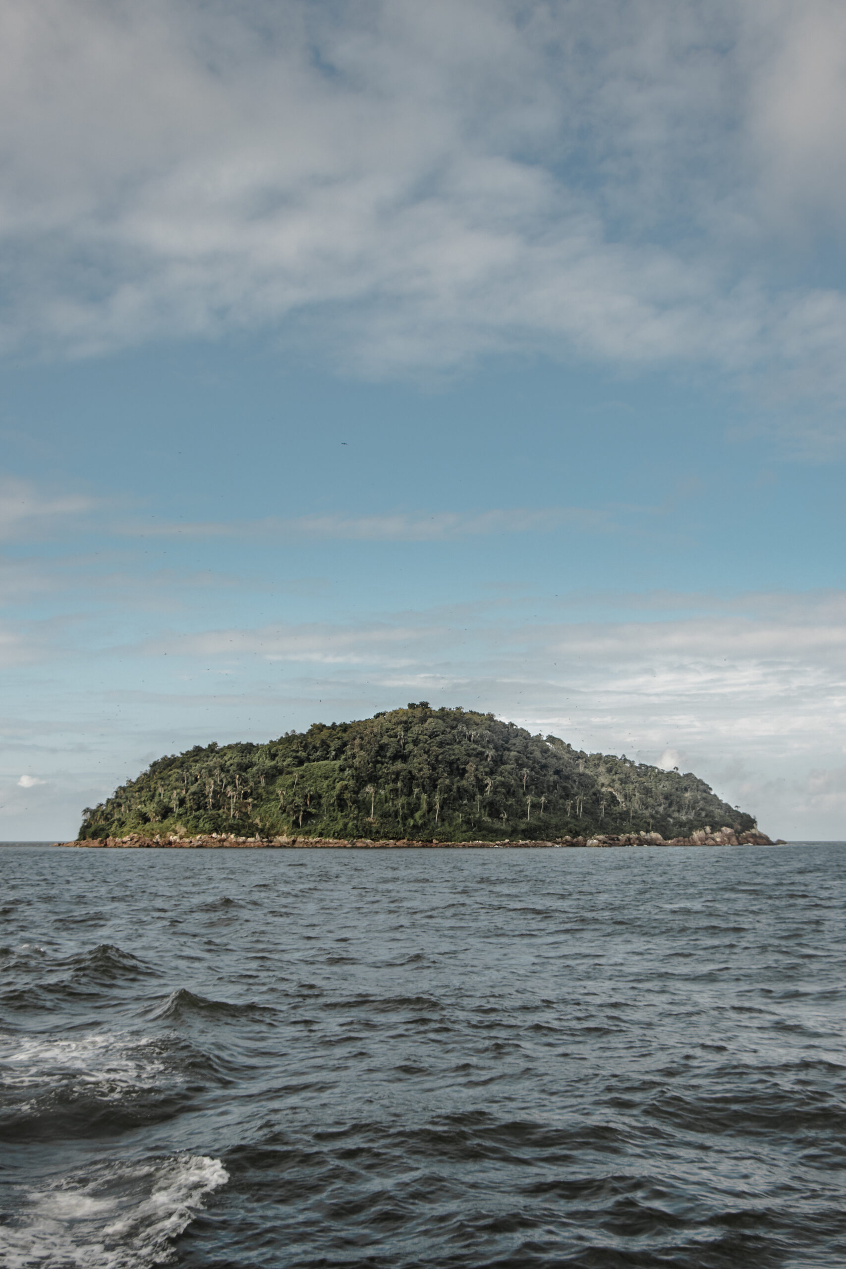 Mesmerizing shot of Ilha Feia island surrounded by ocean